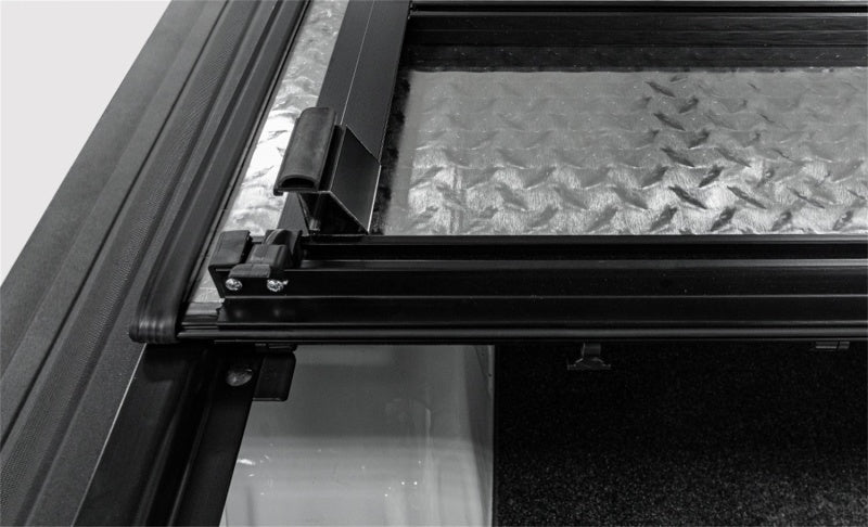 Access LOMAX Tri-Fold Cover Black Urethane 19+ Dodge Ram - 5ft 7in Bed (Except Classic - w/ RamBox) B3040059