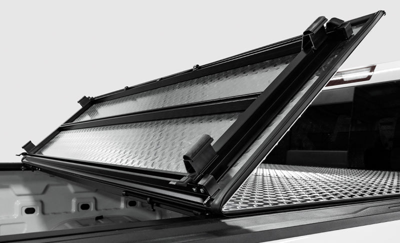 Access LOMAX Tri-Fold Cover 07-21 Toyota Tundra - 5ft 6in Bed (w/ Deck Rail) -  Black Diamond B4050059