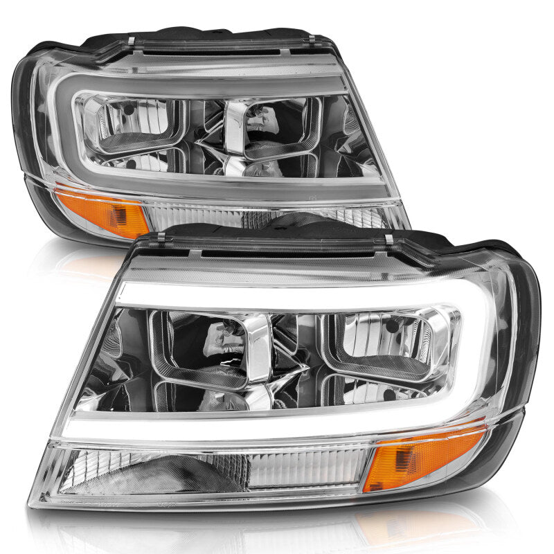 ANZO 1999-2004 Jeep Grand Cherokee Crystal Headlights w/ Light Bar Chrome Housing 111538