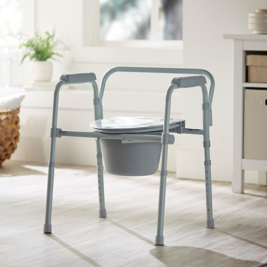 McKesson Folding Fixed Arm Steel Commode Chair, 16-2/3 – 22½ Inch Height 146-11148-4