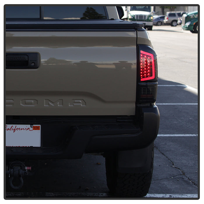 SPYDER xTune 16-18 Toyota Tacoma Light Bar LED Tail Lights - Black Smoked (ALT-JH-TTA16-LBLED-BSM) 9041693