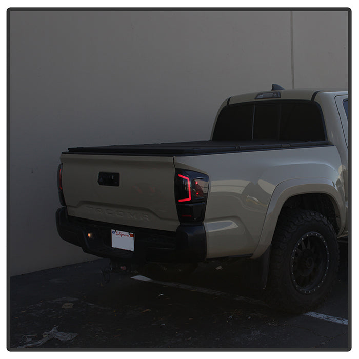 SPYDER xTune 16-18 Toyota Tacoma Light Bar LED Tail Lights - Black Smoked (ALT-JH-TTA16-LBLED-BSM) 9041693