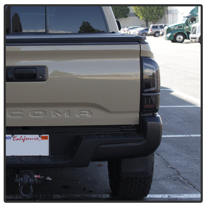 SPYDER xTune 16-18 Toyota Tacoma Light Bar LED Tail Lights - Black Smoked (ALT-JH-TTA16-LBLED-BSM) 9041693