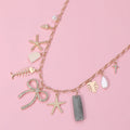 Stone Paved Bow Metal Starfish Fish Shell Pearl Tropical Leaf Charm Station Necklace