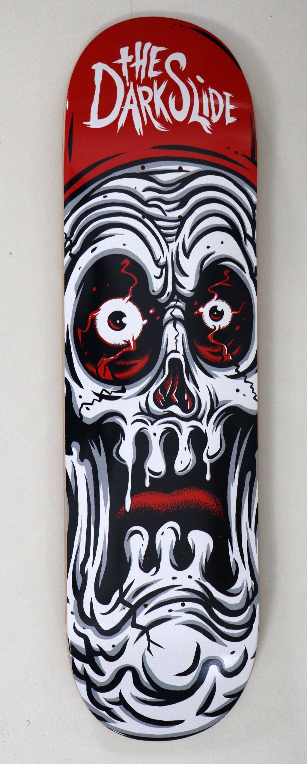 The Dark Slide x Tim Baron "Ghoul Skull" 8" Complete Skateboard