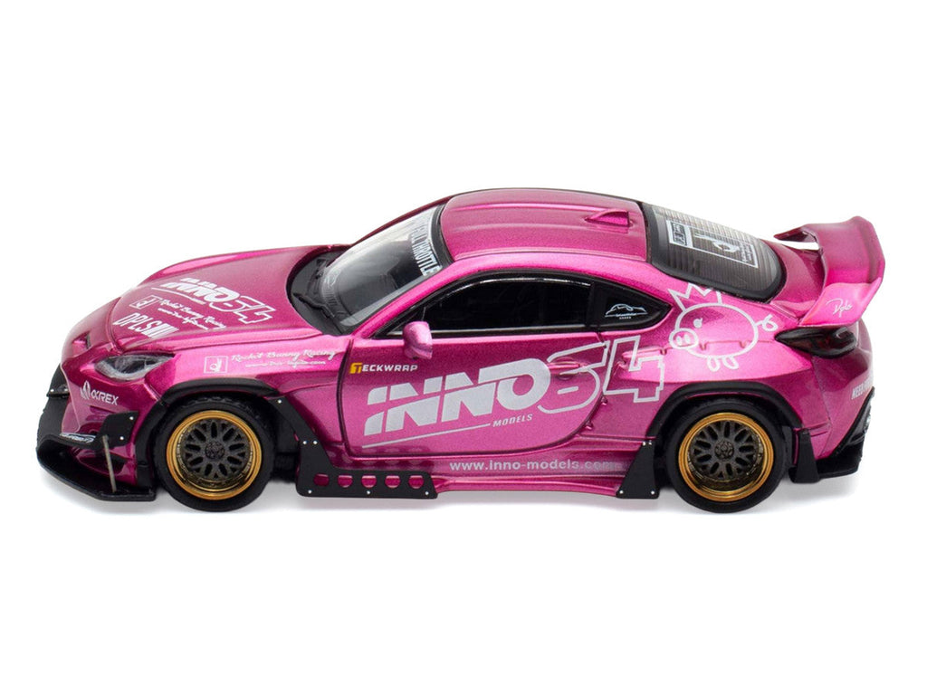 Toyota GR86 "Pandem Rocket Bunny" RHD (Right Hand Drive) Pink Metallic with Graphics "APA XPO 2025 Event Exclusive" 1/64 Diecast Model Car by Inno Models