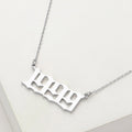 White Gold Dipped 1999 Birth Year Plate Pendant Necklace