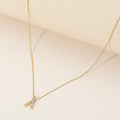 SECRET BOX_Brass Metal Stone Paved Eiffel Tower Pendant Necklace