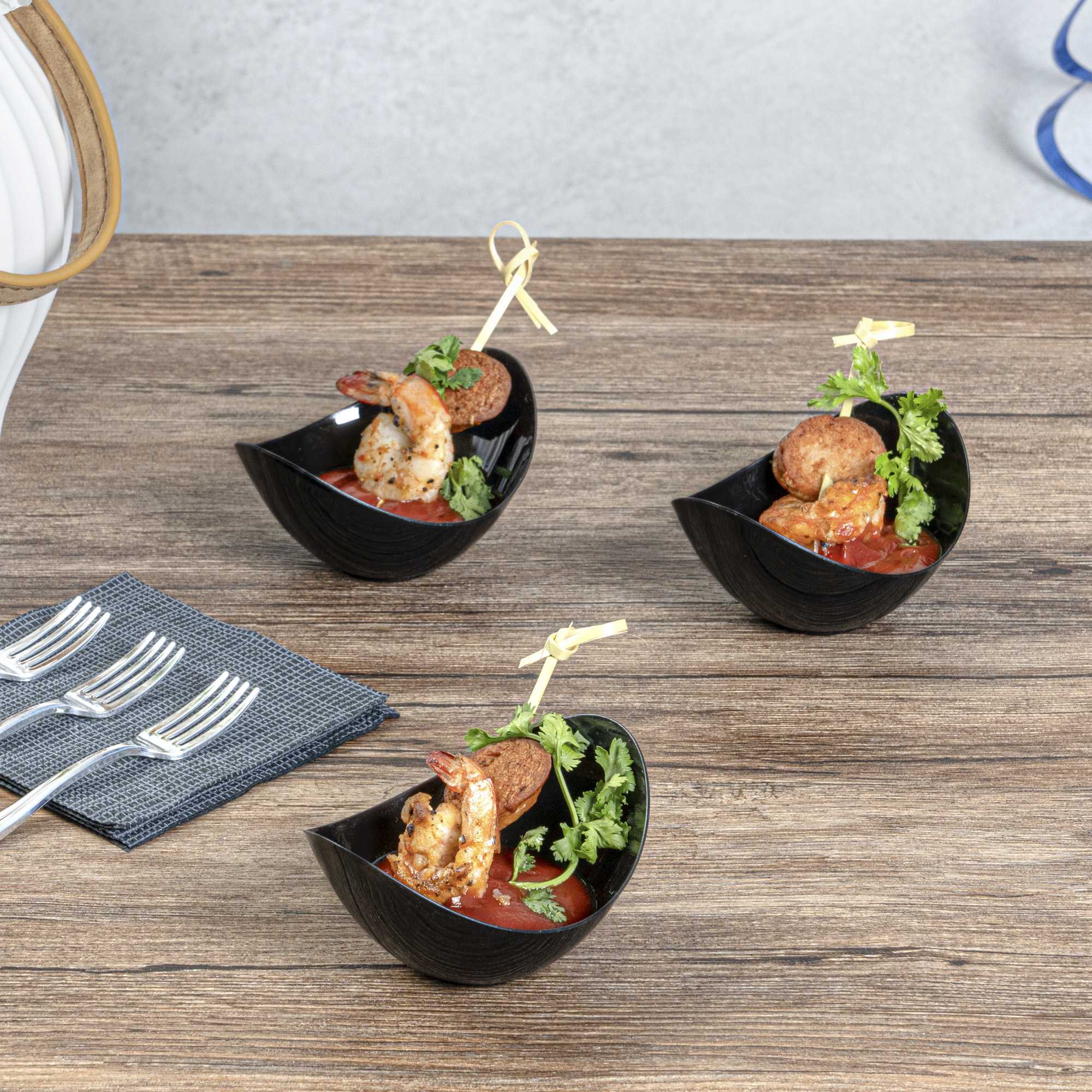 Mini Serve 2 oz Oval Black Plastic Alato Tasting Dish - 3 1/2" x 2 3/4" x 1 3/4" - 100 count box