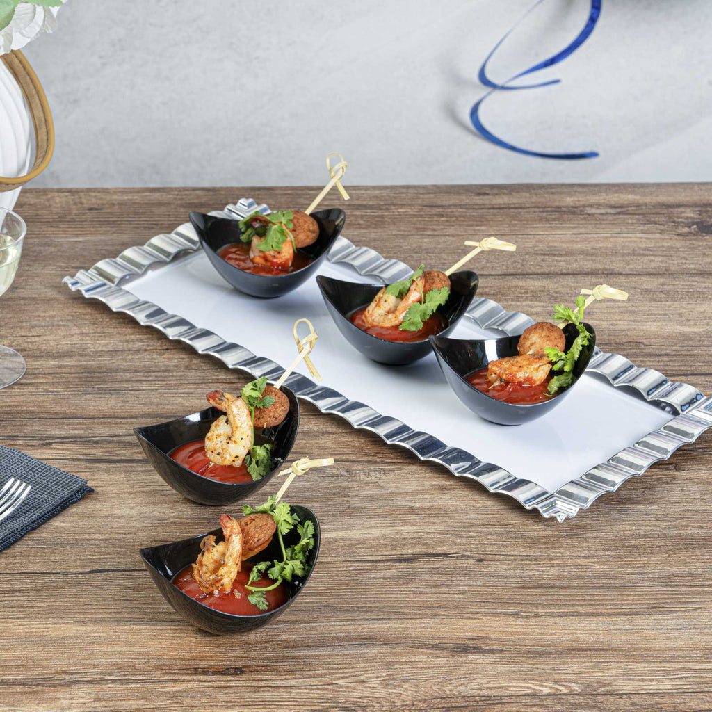 Mini Serve 2 oz Oval Black Plastic Alato Tasting Dish - 3 1/2" x 2 3/4" x 1 3/4" - 100 count box