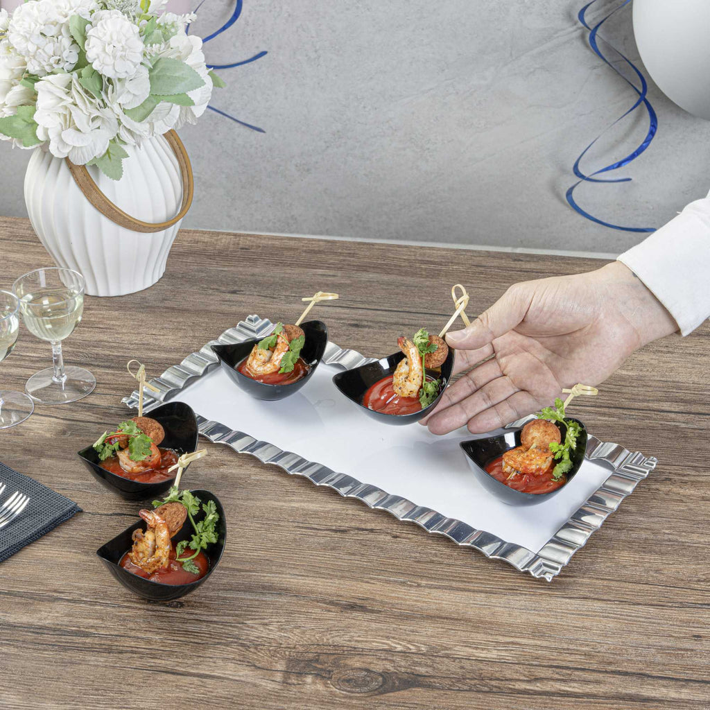 Mini Serve 2 oz Oval Black Plastic Alato Tasting Dish - 3 1/2" x 2 3/4" x 1 3/4" - 100 count box