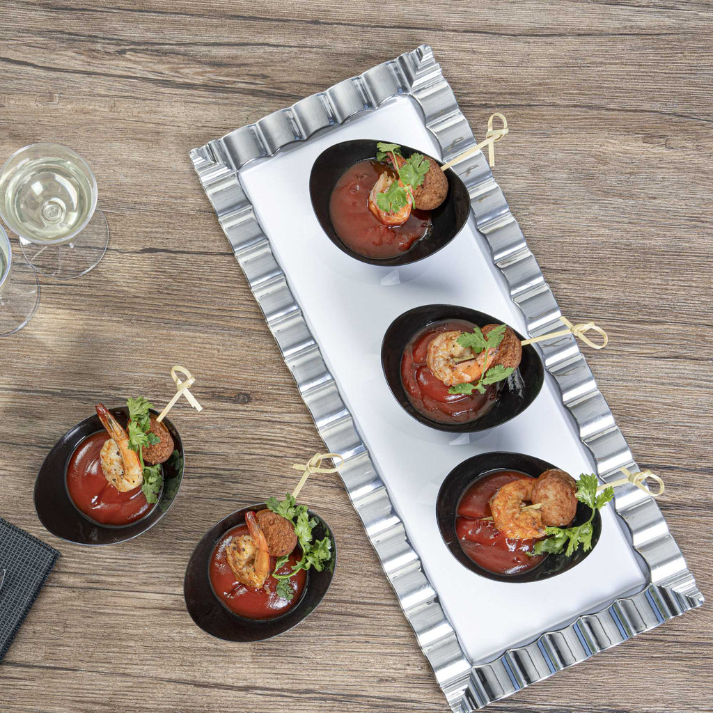 Mini Serve 2 oz Oval Black Plastic Alato Tasting Dish - 3 1/2" x 2 3/4" x 1 3/4" - 100 count box