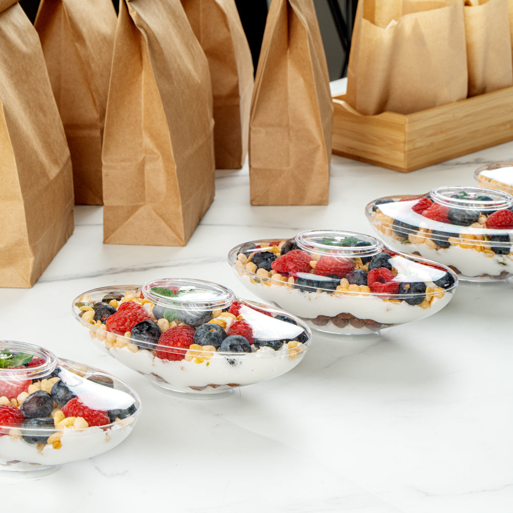 Mini Serve 6 oz Oval Clear Plastic Deli Cup - Stackable, with Lid - 5 1/2" x 3 1/4" x 2 1/2" - 100 count box