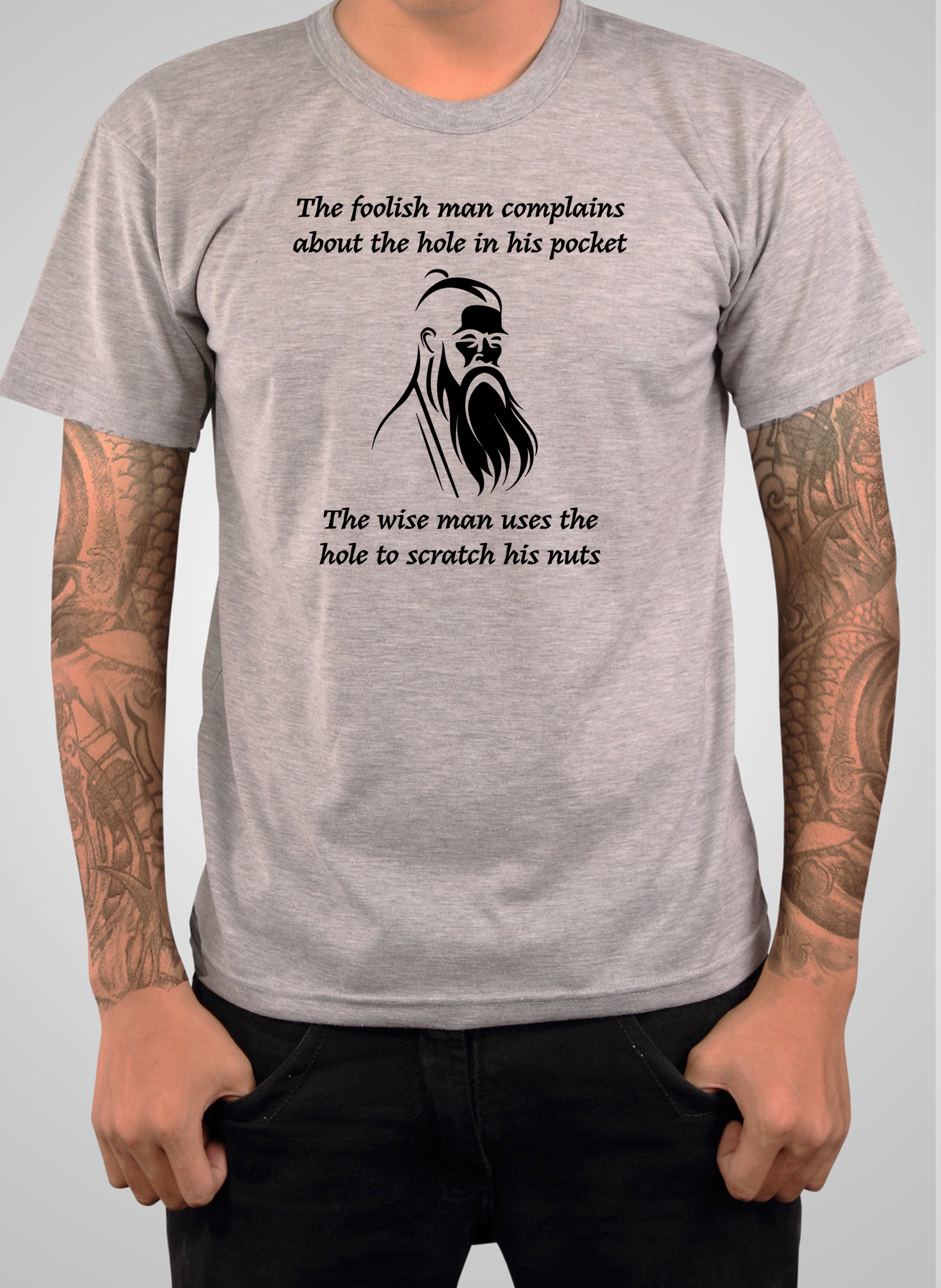 The foolish man complains about the hole in his pocket T-Shirt