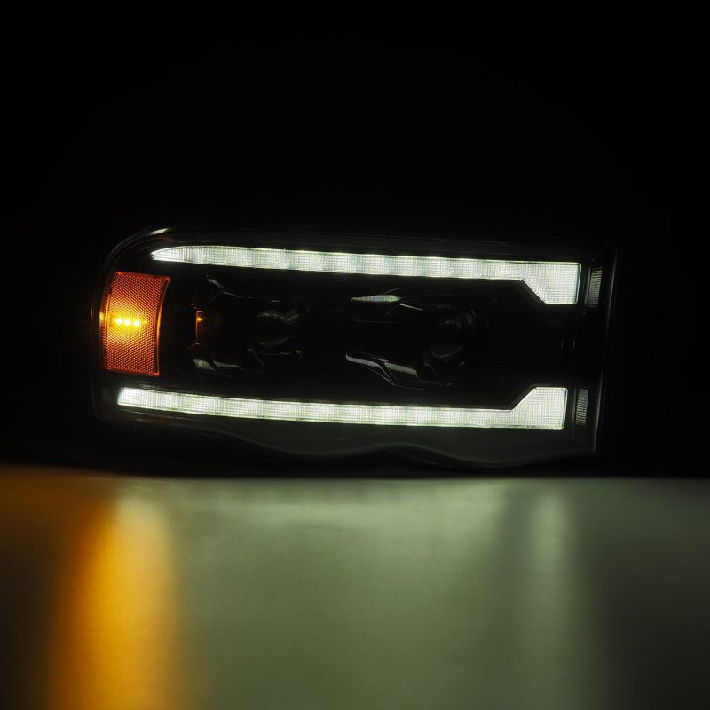 AlphaRex 02-05 Dodge Ram 1500 PRO-Series Projector Headlights Plank Style Alpha Black w/Seq Signal 880572 *Discontinued