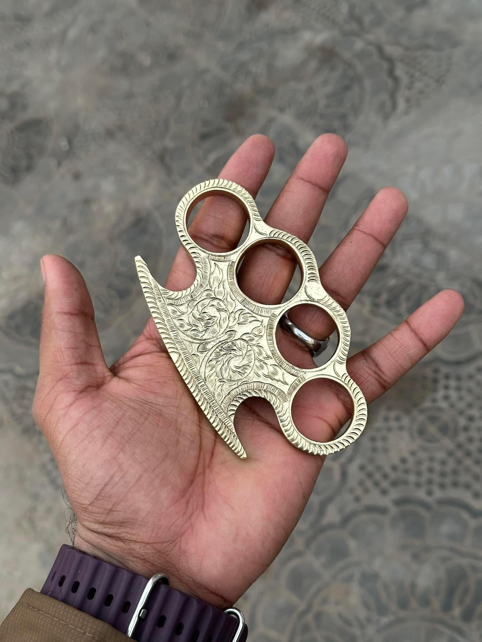 Custom engraved brass knuckle - PhishStones Products