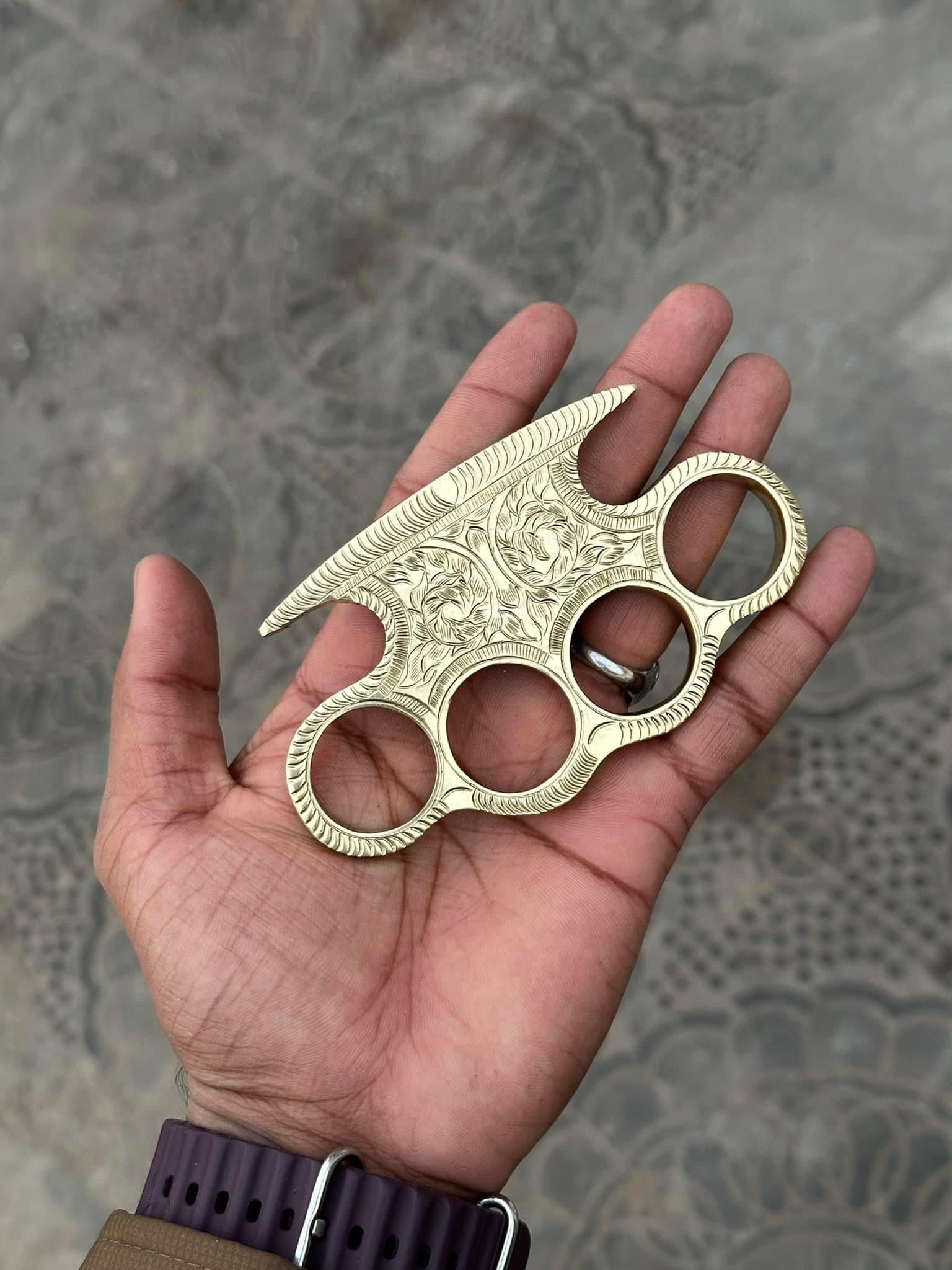 Custom engraved brass knuckle - PhishStones Products