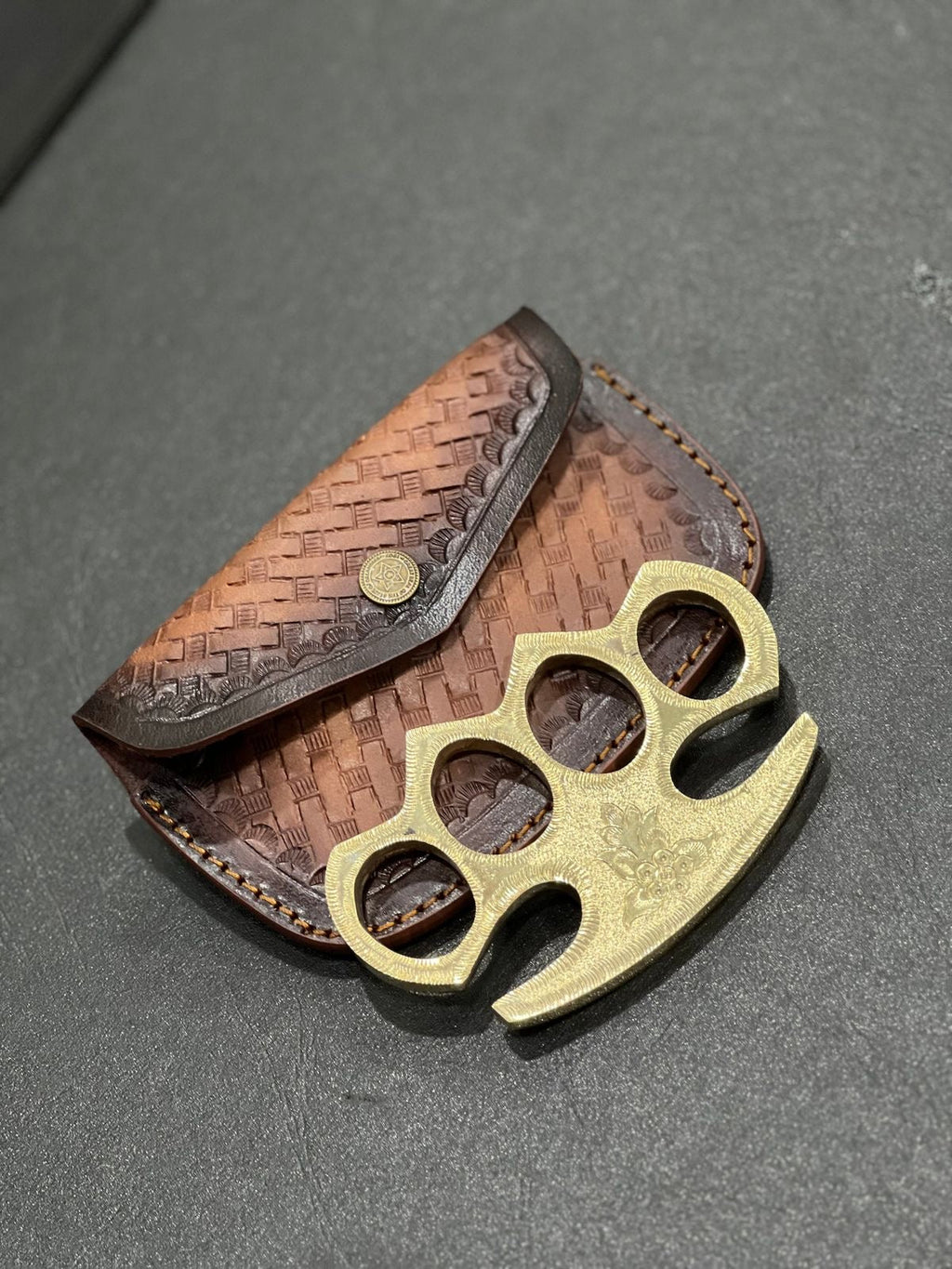 Custom engraved brass knuckle - PhishStones Products
