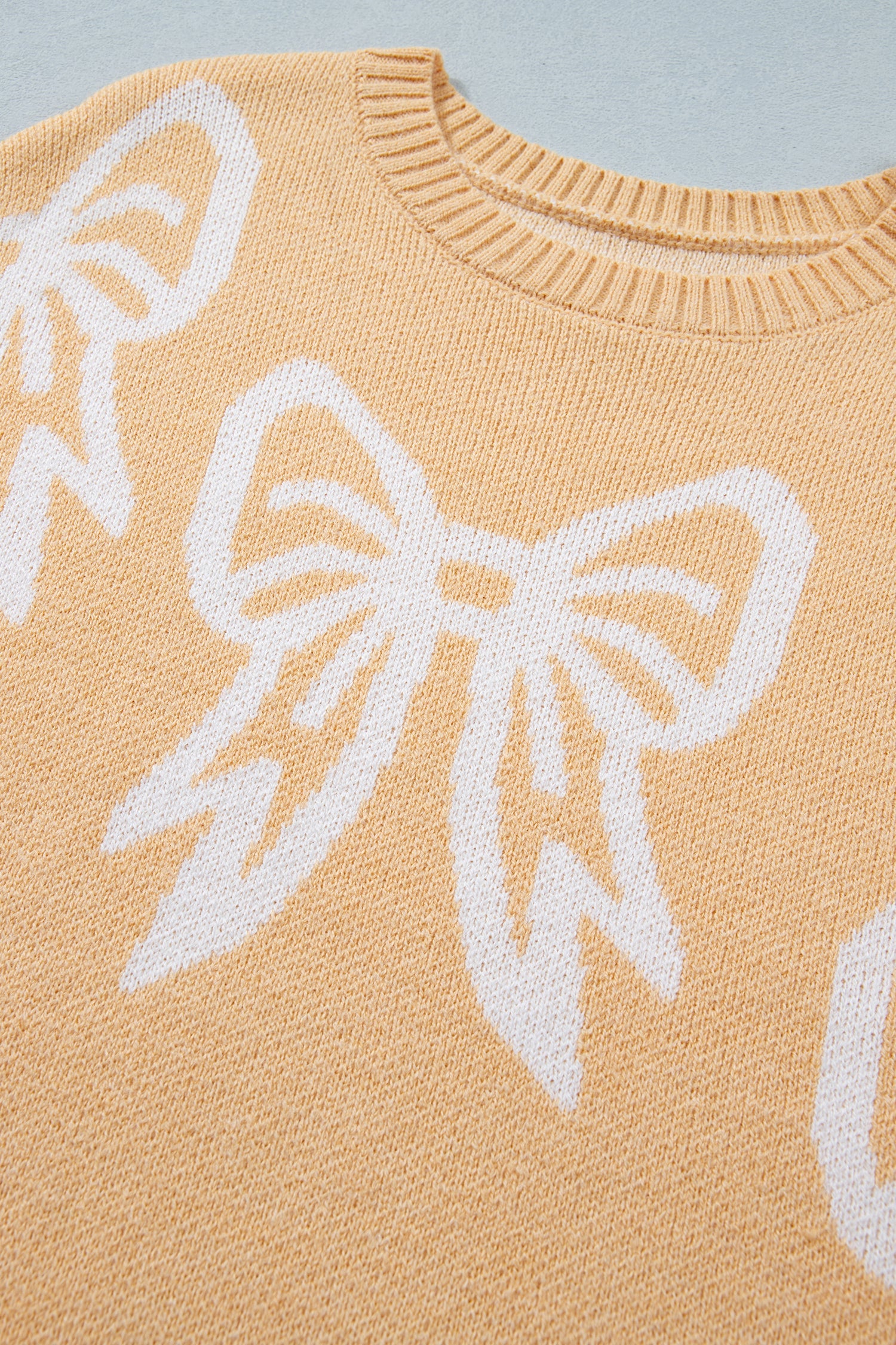 Golden Fleece Bow Pattern Drop Shoulder Loose Sweater
