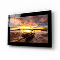 Fiery Dusk Stranded Boat Glass Wall Art