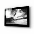 Black and White Longtail Boat on Beach Glass Wall Art