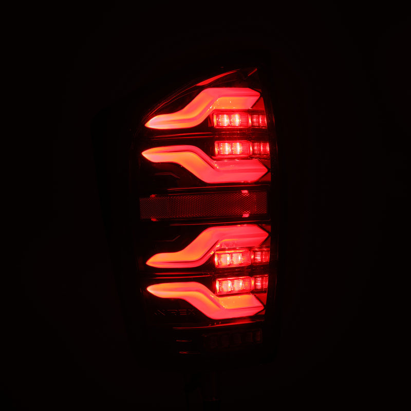 AlphaRex 16-21 Toyota Tacoma LUXX LED Taillights Alpha Blk w/Activ Light/Seq Signal 680080 *Discontinued