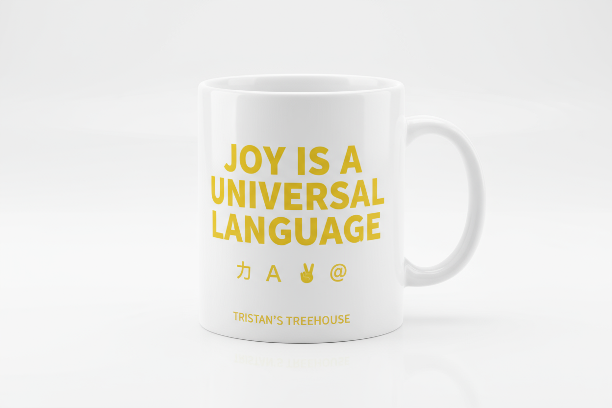 Joy is a Universal Language – Mug