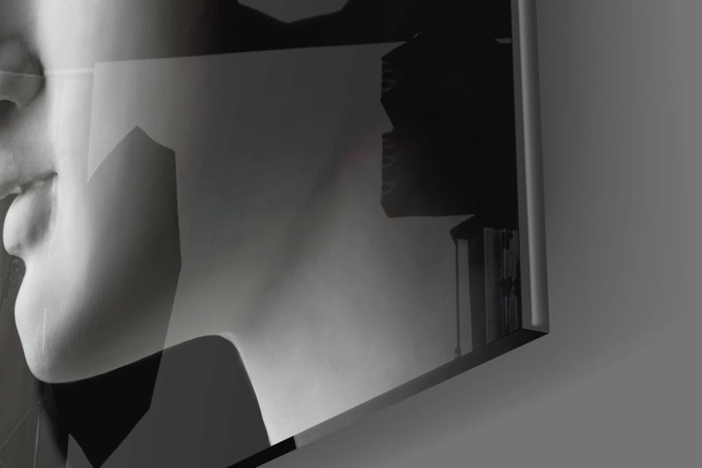 Black and White Mirrored Statue Faces Glass Wall Art